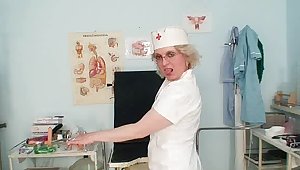 Perverted Lady in nurse uniform shows huge boobs