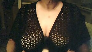 Amateur mature short haired bitch in knitted black nightie shows huge tits