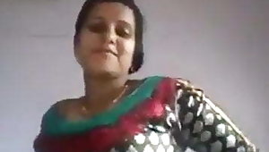 Young Indian housewife showing big boobs